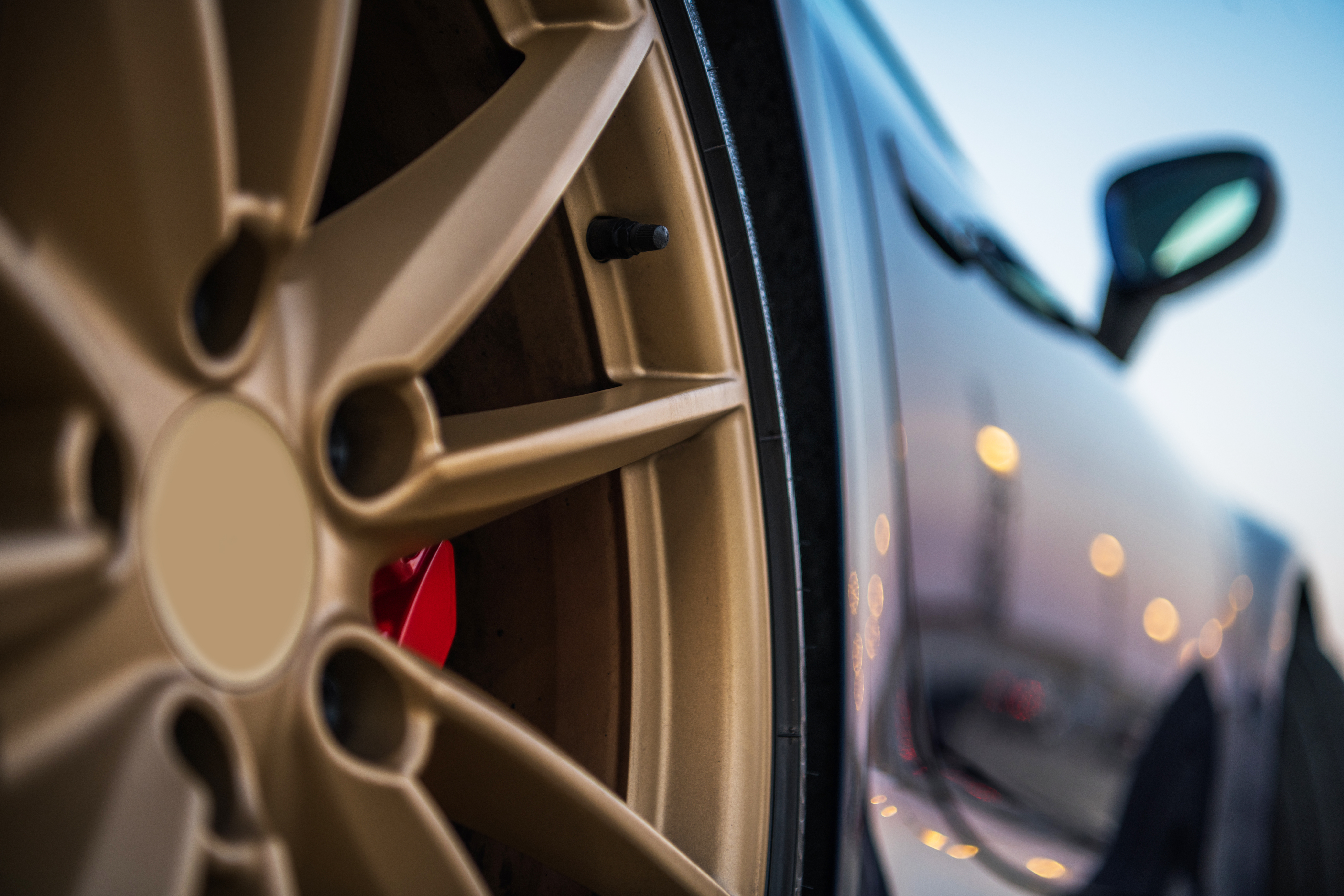 close-up-of-golden-tire-rim-of-exotic-car-2023-11-27-05-21-07-utc